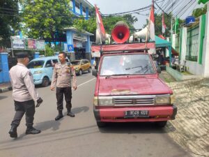 Titi Kumpul Massa Aksi Persatuan Pemuda Mahasiswa Tolak Korupsi Depan Sekolah SMPN 8 Menteng