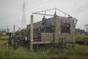 Satgas Yonif 503 Kostrad Bangun Fasilitas Gereja Kenyam