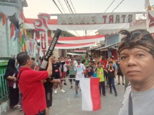 Bhabinkamtibmas Tanah Tinggi bersama FKDM Lakukan Pengamanan Lari Maraton HUT RI