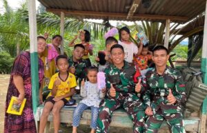 Satgas Yonarmed 11 Kostrad Mengabdi Dengan Cinta, TNI dan Harapan Anak – Anak di Perbatasan