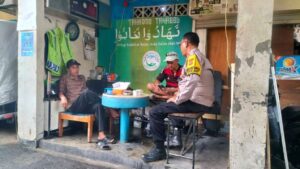 Bhabinkamtibmas Benhil Berikan Imbauan Kamtibmas Kepada Ketua RT 05/07 Dan Warga Sampaikan Pilkada Damai