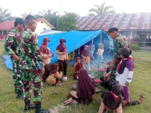 Satgas Yonarmed 11 Kostrad Gelar Pendampingan Kegiatan Pramuka dan Pendidikan di SDN 005 Sei Manggaris