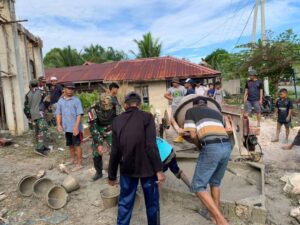 Semangat Kebersamaan Satgas Pamtas Yonarmed 11 Kostrad Bersama Warga Bangun Masjid