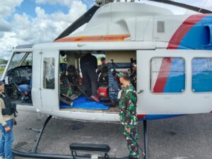 Kodim 1715/Yahukimo Bantu Polri Evakuasi Jenazah Korban Kekejaman OPM di Muara Kum, Distrik Seradala
