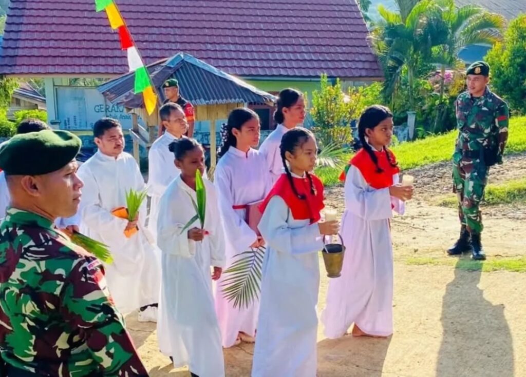 Peran Satgas Pamtas Yonarmed 11 Kostrad dalam Perayaan Pekan Suci Minggu Palma di Perbatasan