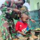 Satgaster Yonif 754 Kostrad Rayakan Hari Lahir Pancasila dengan Cukur Gratis untuk Anak-Anak Sugapa