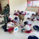 Pos Siding Bersama Komunitas Pelita Batas dan Roema Djiwa Tingkatkan Literasi Anak-Anak di Wilayah Perbatasan