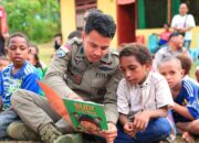 Personel Ops Damai Cartenz 2026 Hadirkan Keceriaan Lewat Belajar dan Bermain Bersama Anak Taman Baca Koya Tengah