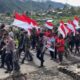 Peringatan Hari Lahir Pancasila, 800 Warga Puncak Jaya Kirab Bendera 50 Meter