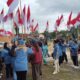 Satgas Yonarmed 13 Kibarkan Merah Putih Sepanjang 4 Kilometer di Perbatasan Sambut HUT Ke-81 Kemerdekaan RI