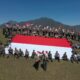 Semangat Kebangsaan di Perbatasan, Satgas Pamtas Yonarhanud 2 Kostrad Kibarkan Bendera Raksasa di Bukit Bijaelsunan