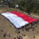 Merah Putih Raksasa 81 x 26 Meter Berkibar di Perbatasan NTT