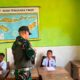 Yonarmed 12 Kostrad Dampingi Anak Perbatasan Belajar Membaca