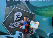 Gemilang di Pangandaran Run 2026, Prajurit Yonif 754/ENK Raih Juara 1 Piala Panglima TNI